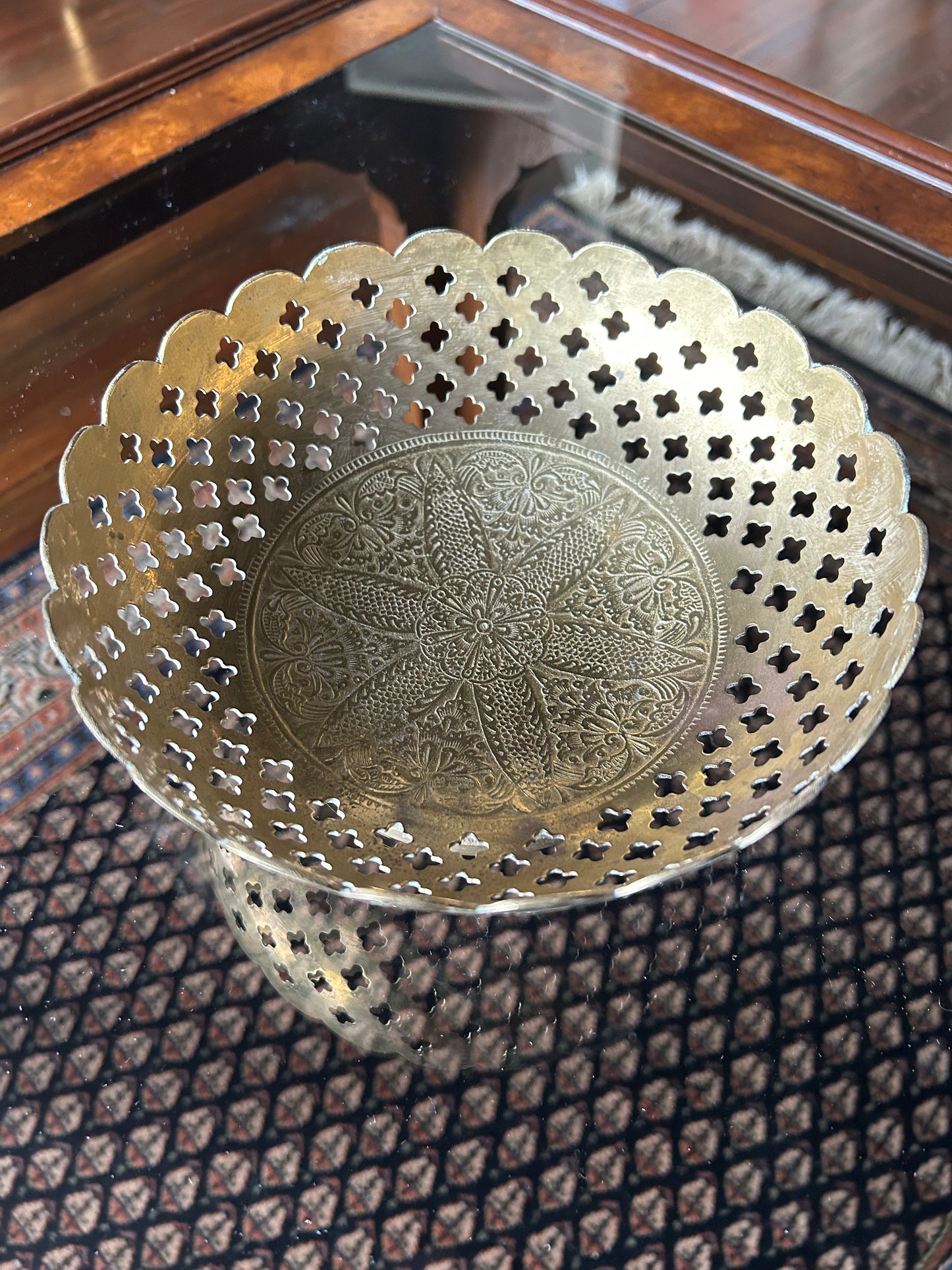 ornate brass bowl with intricate cutouts