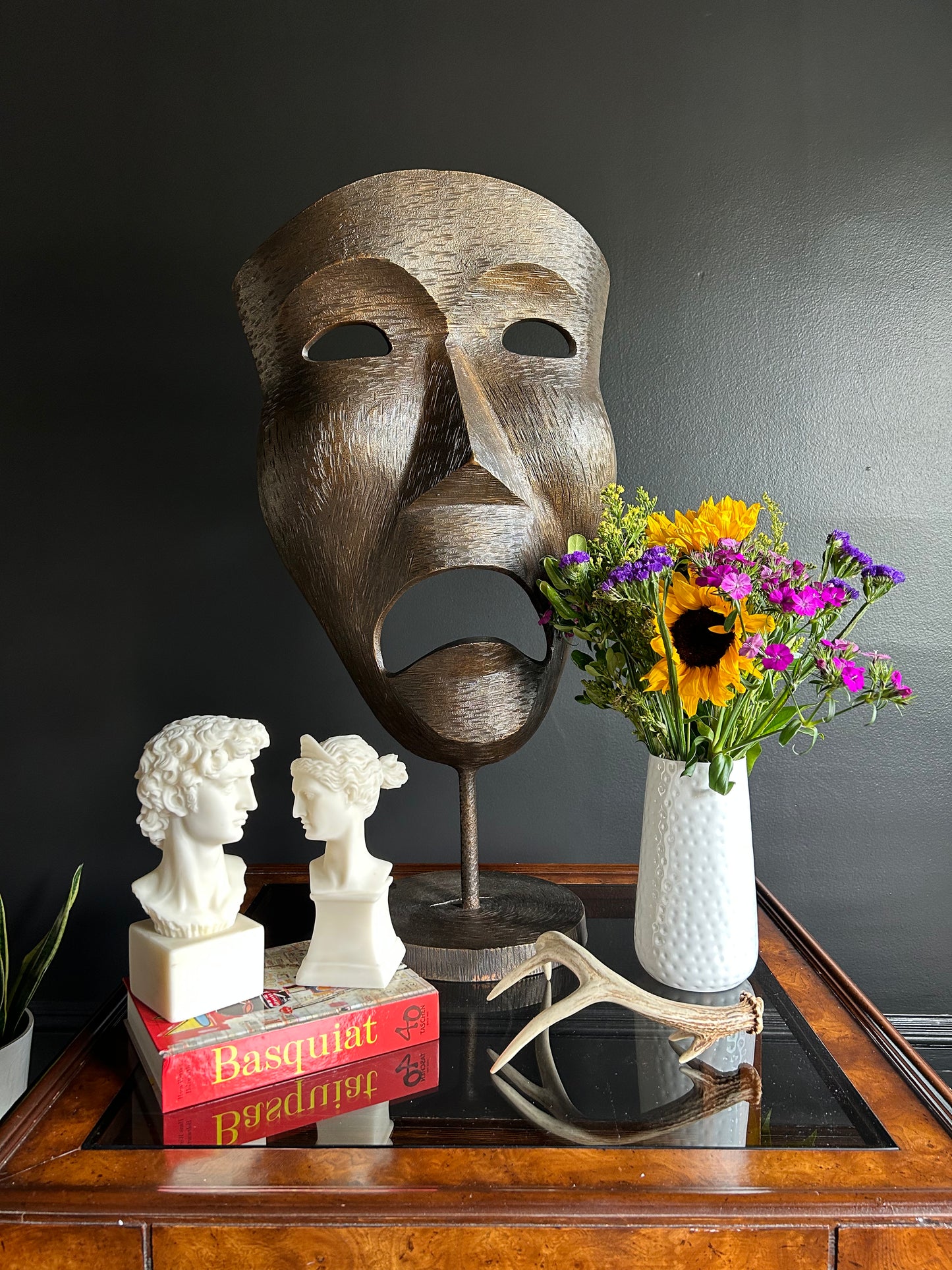 large bronze dramatic mask