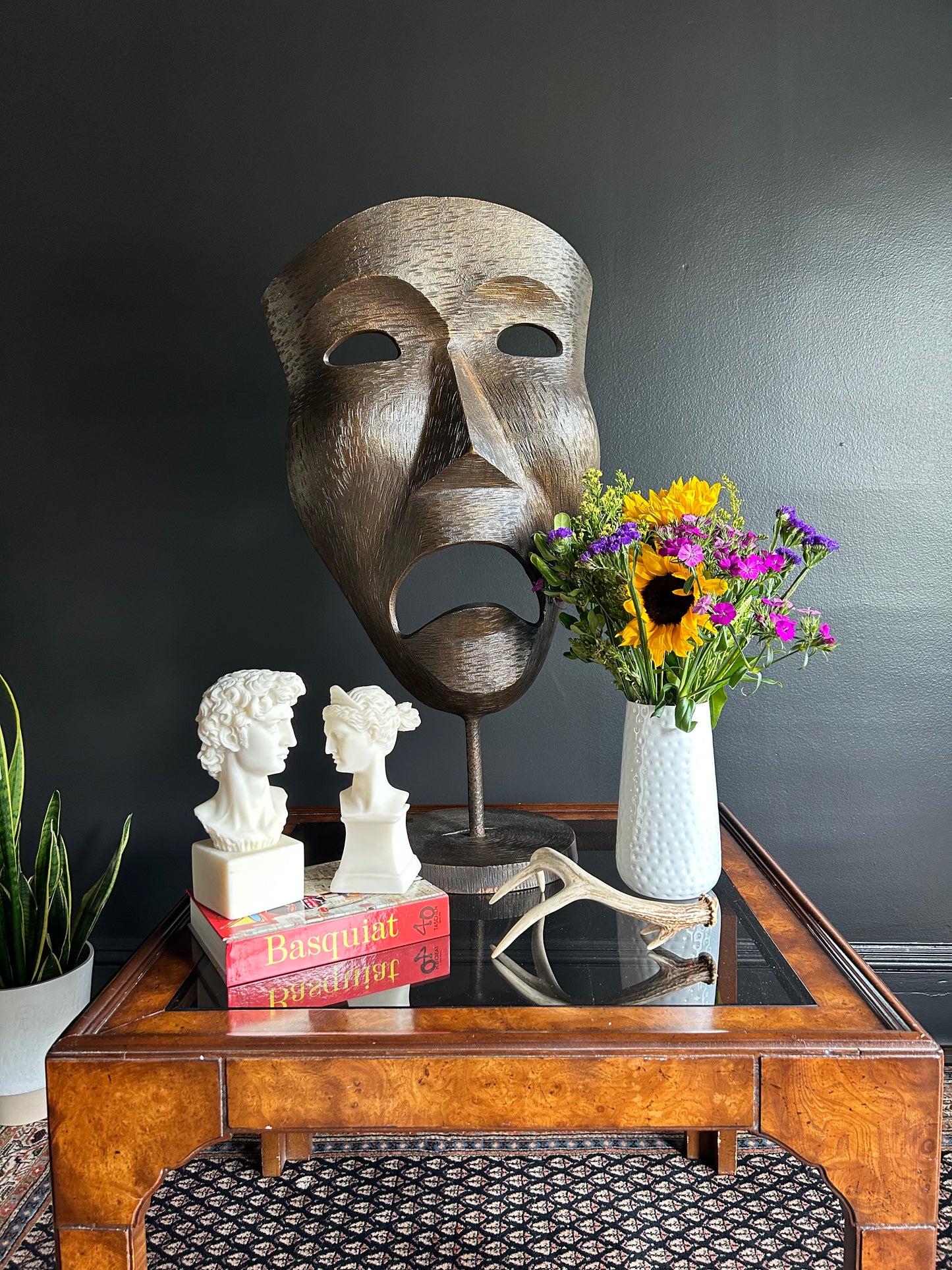 large bronze dramatic mask