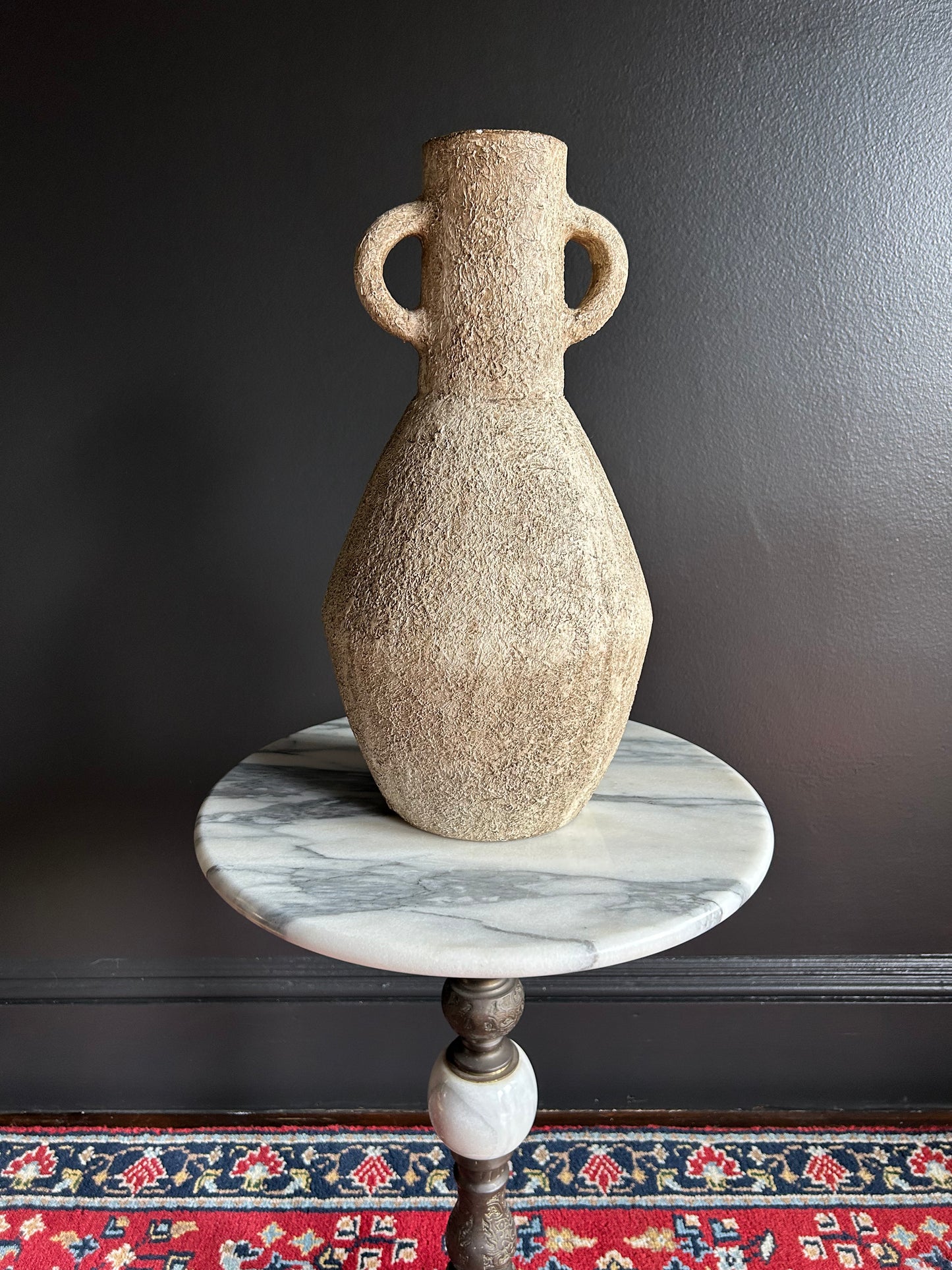heavy, two-handled vessel