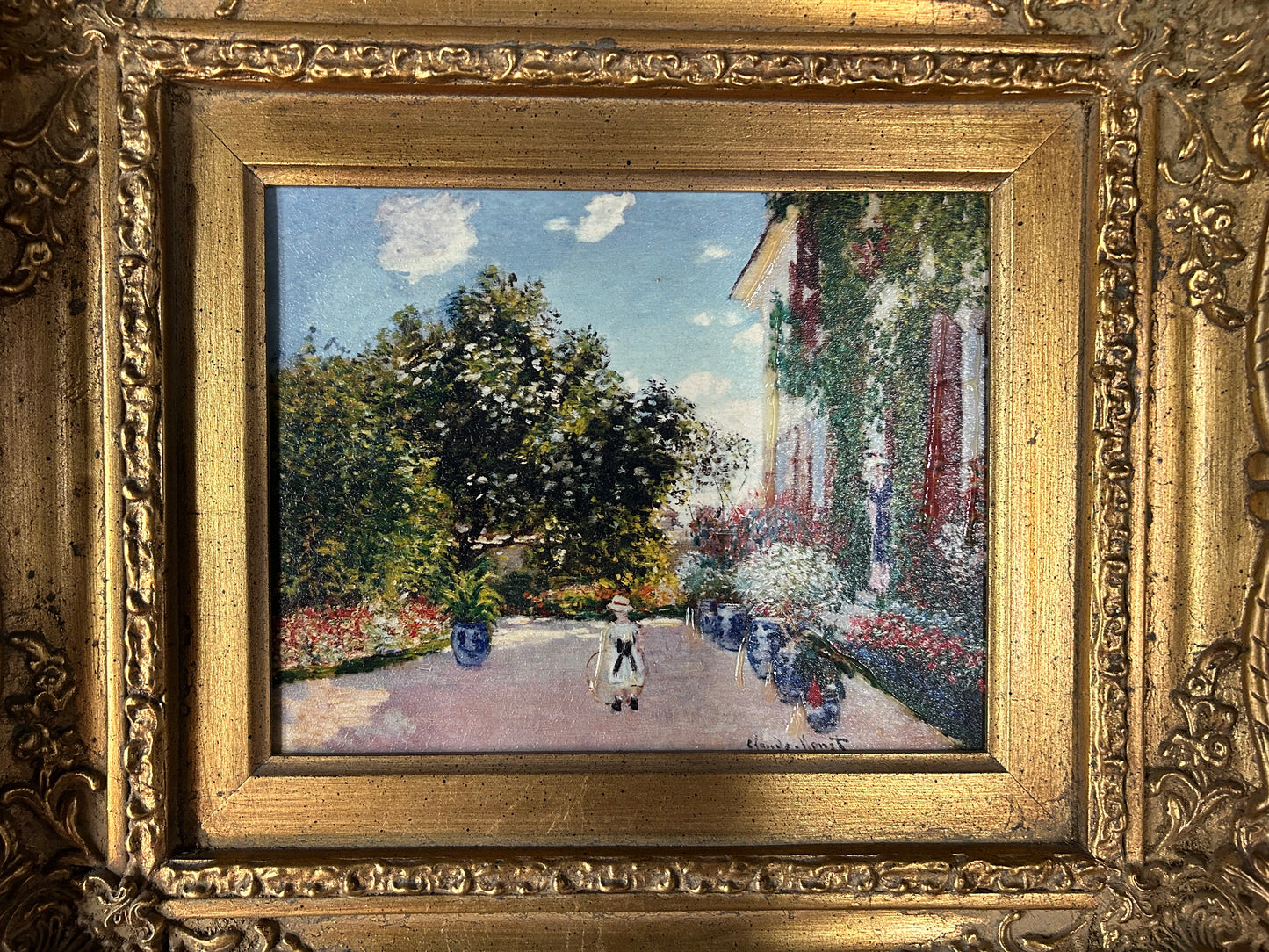 Monet 'Artist's House' reproduction with gilded frame