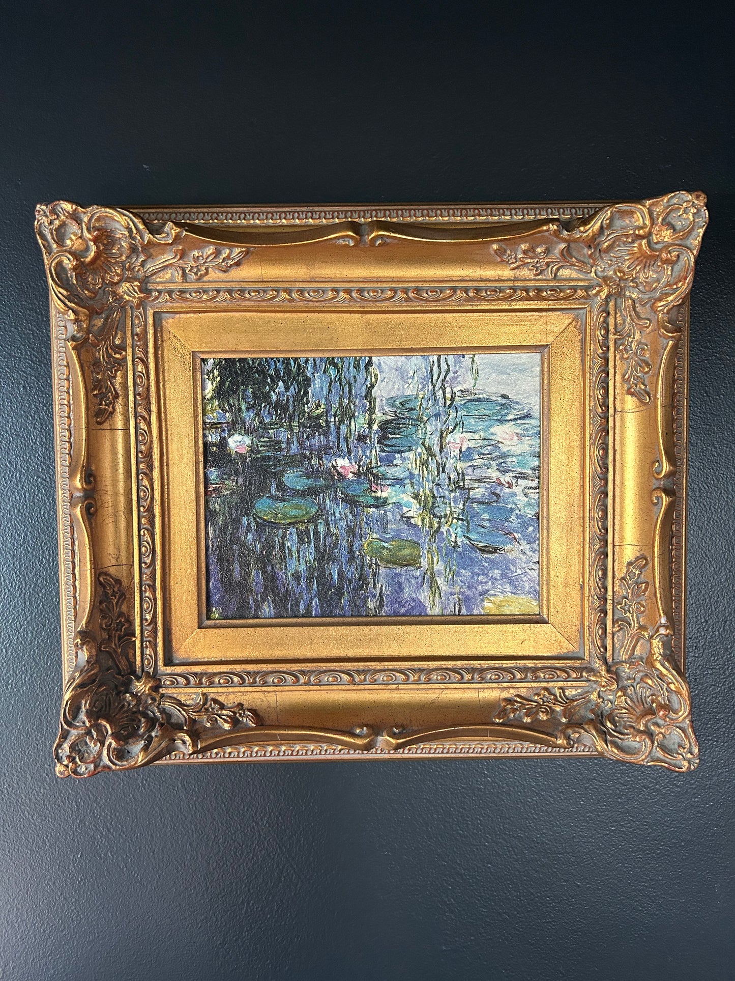 Monet 'Water Lilies' reproduction with gilded frame
