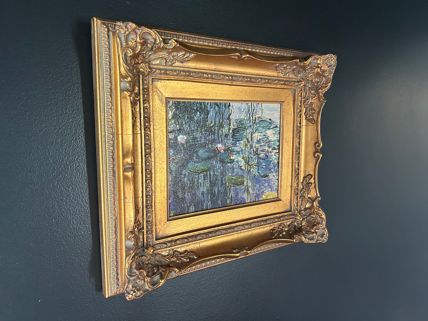 Monet 'Water Lilies' reproduction with gilded frame