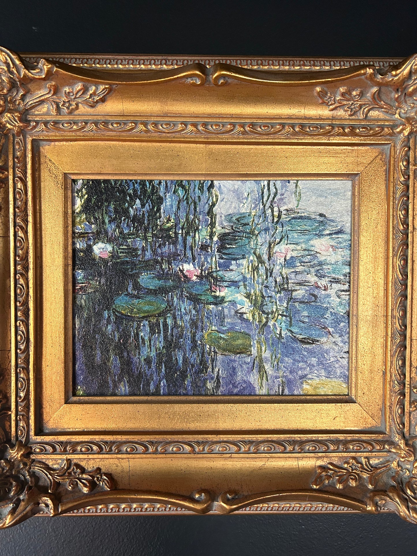 Monet 'Water Lilies' reproduction with gilded frame
