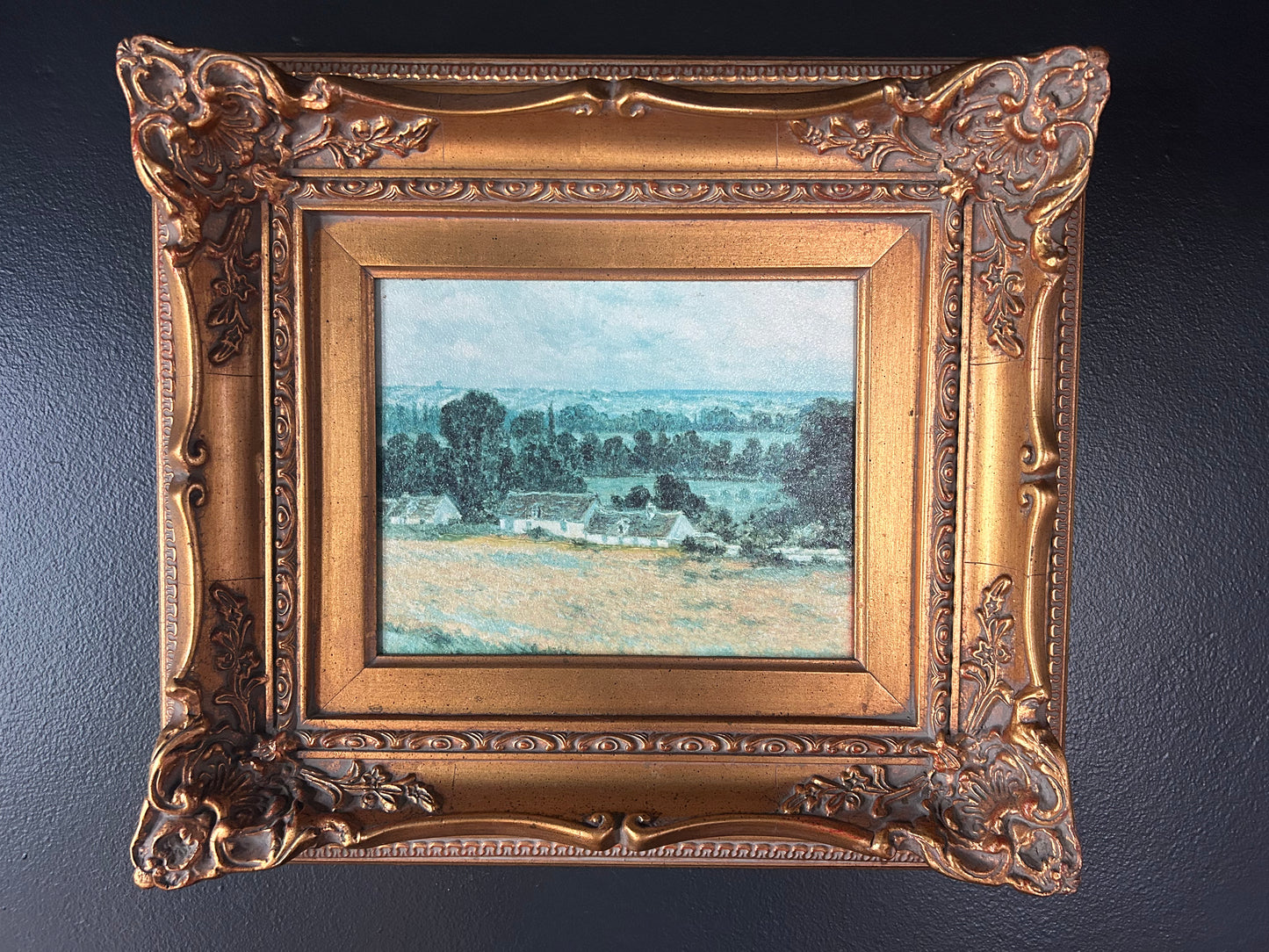 expressionist meadow and home reproduction with gilded frame