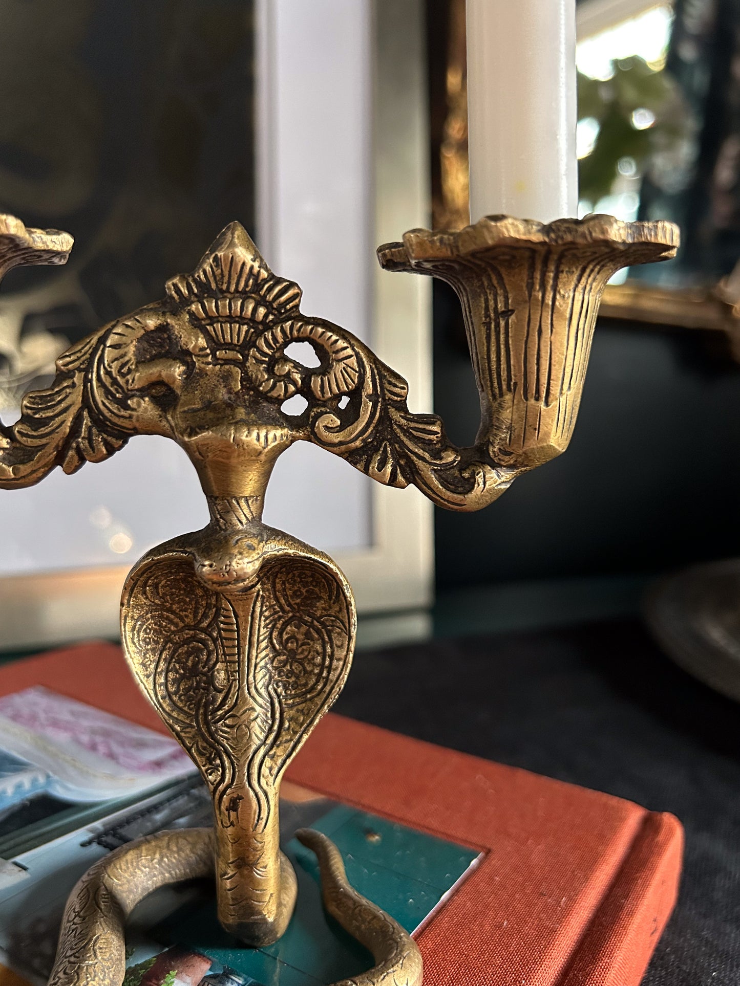 hand-carved brass serpent candle holder