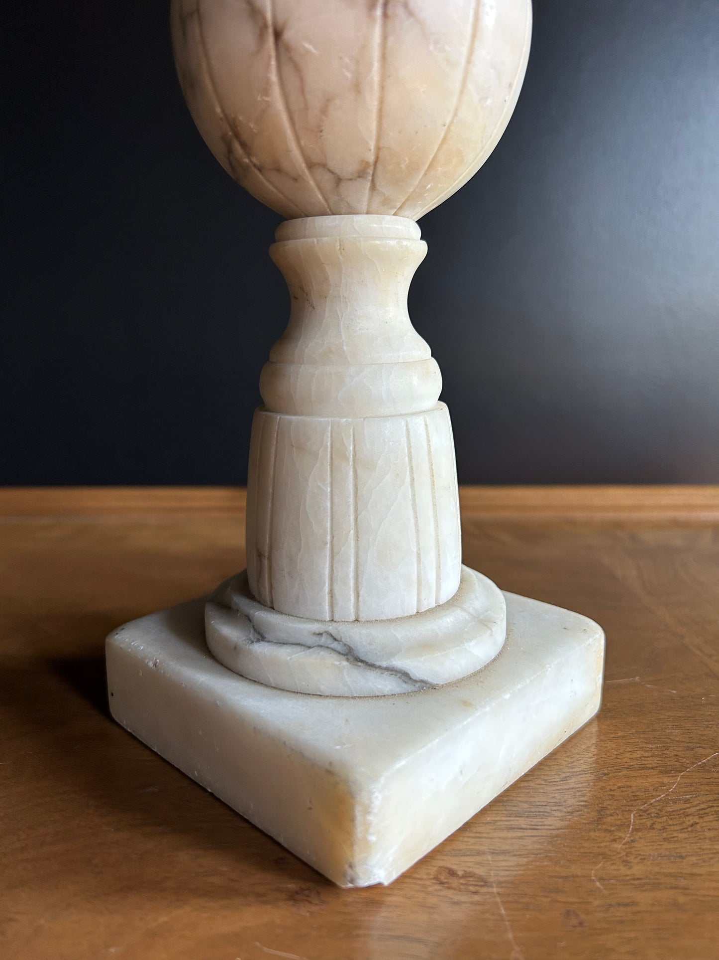 alabaster columnar with feathers