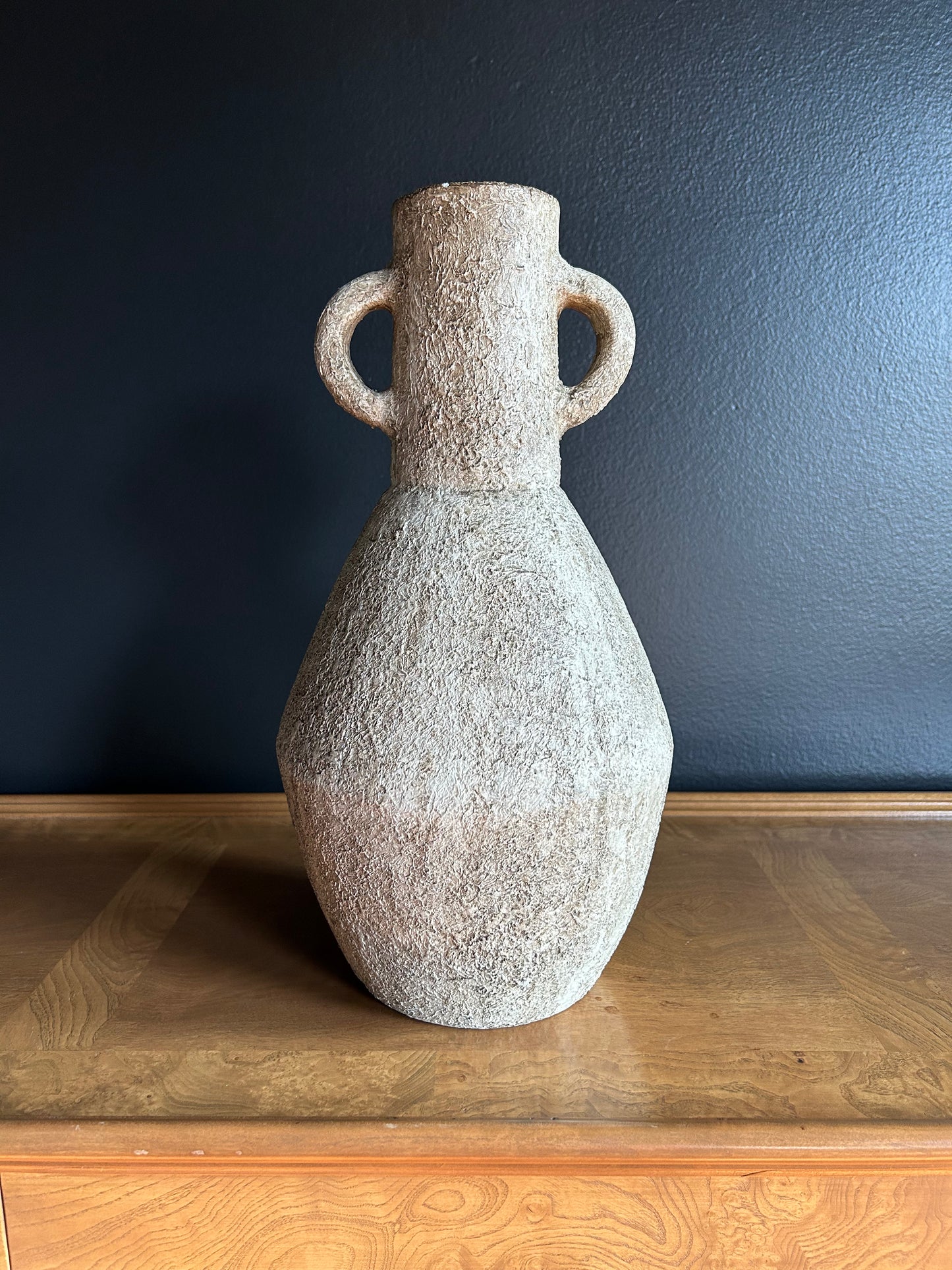 heavy, two-handled vessel