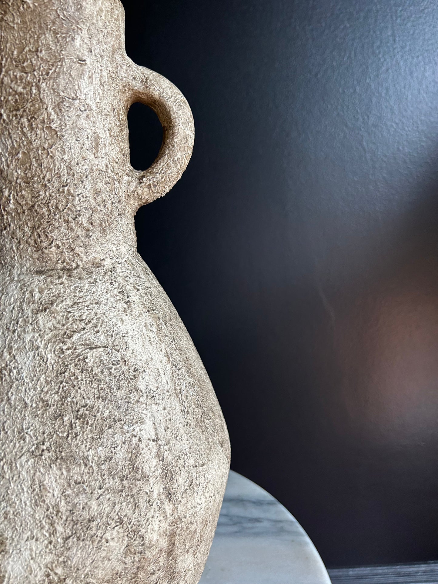 heavy, two-handled vessel