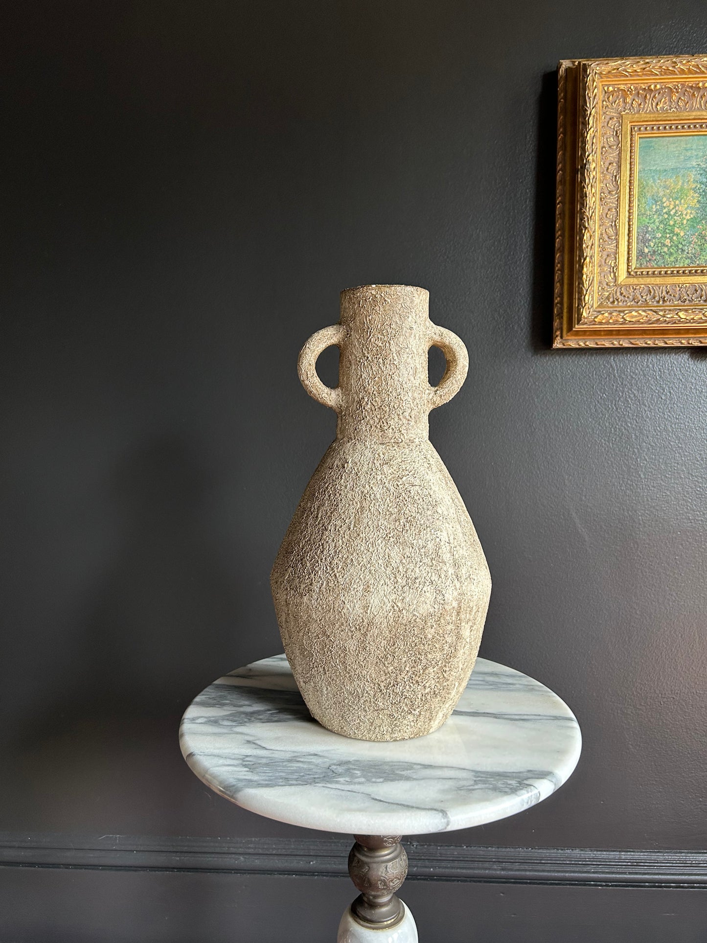 heavy, two-handled vessel