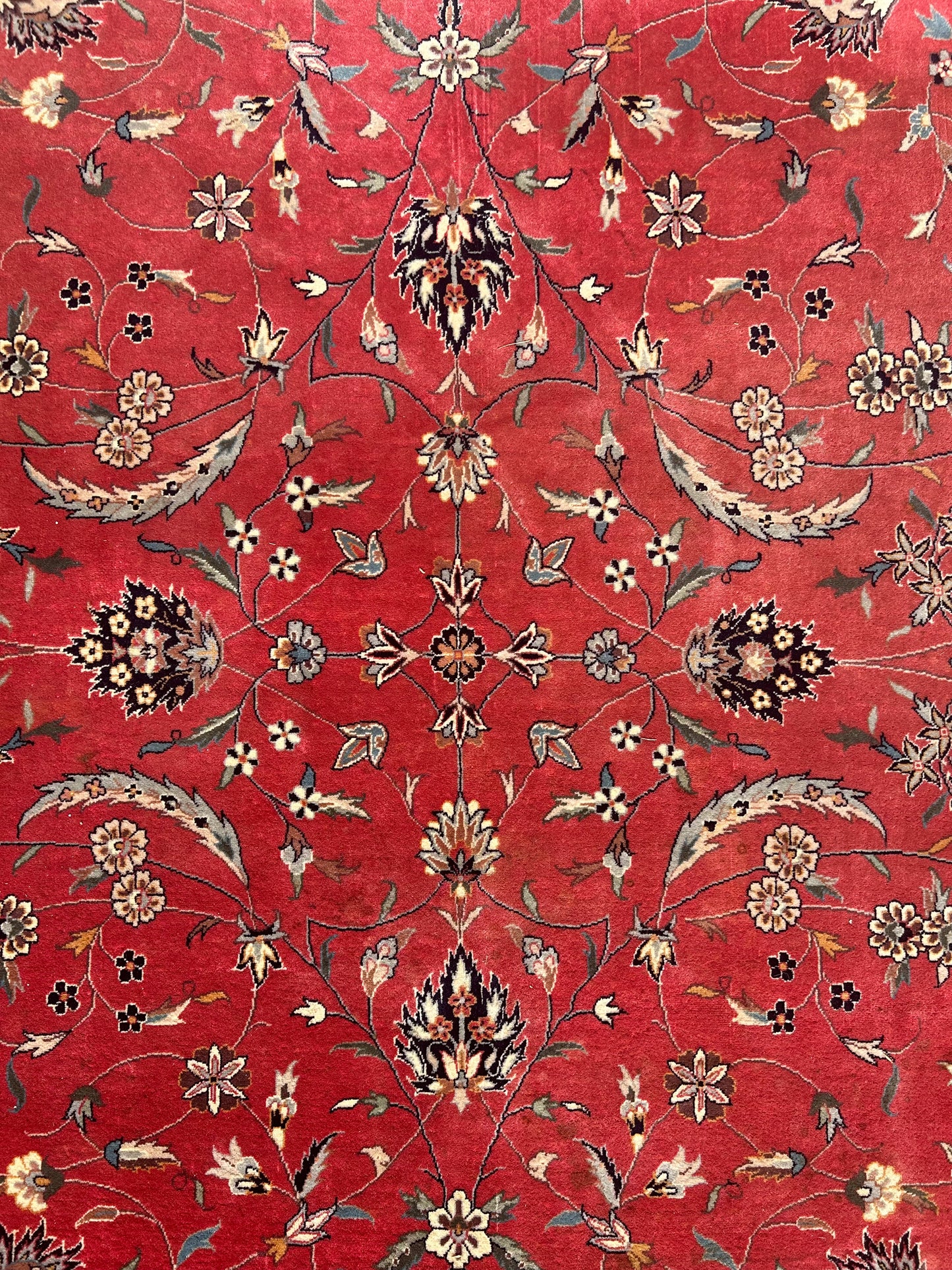 pink and black handwoven Sarouk rug