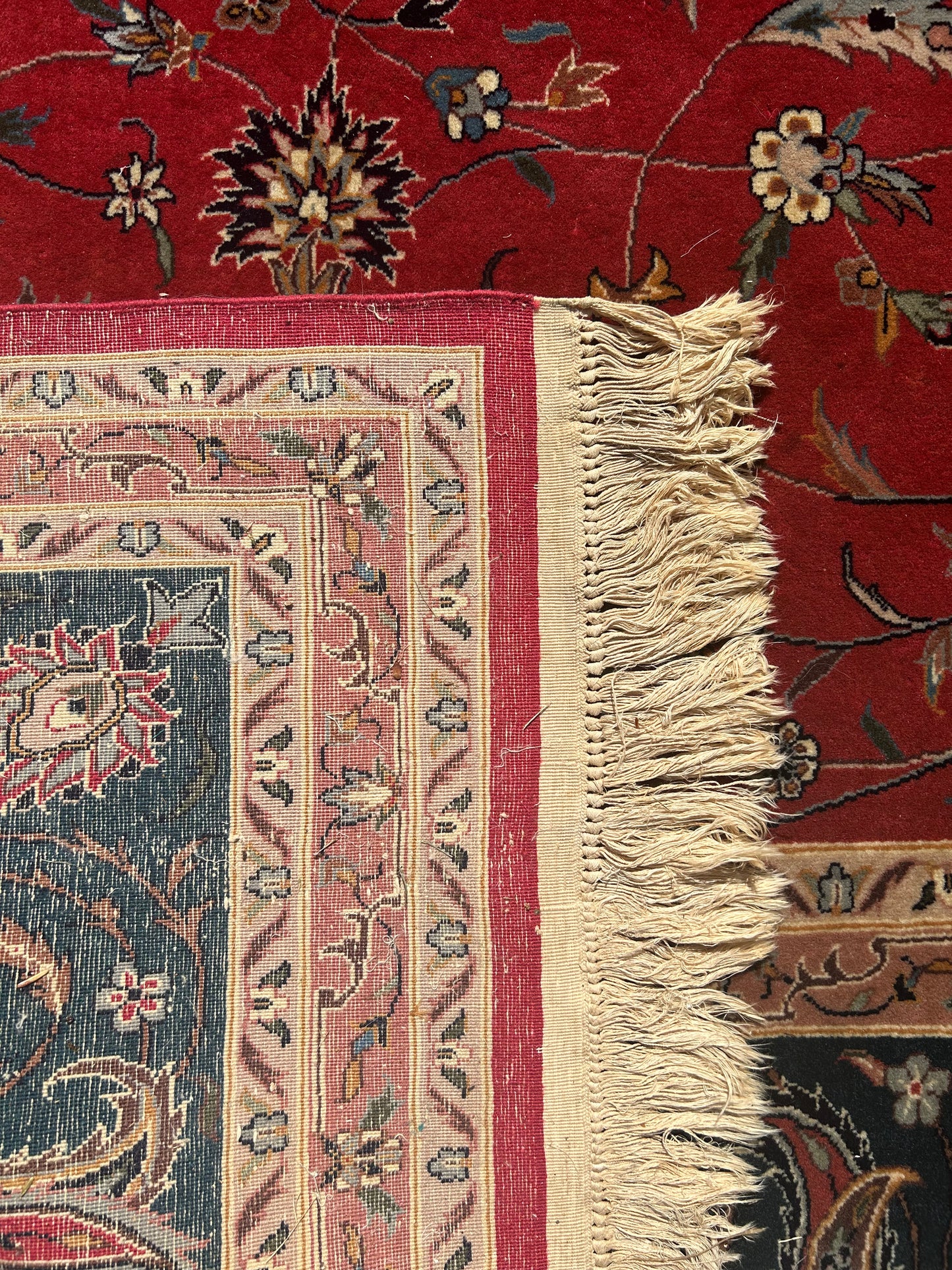 pink and black handwoven Sarouk rug