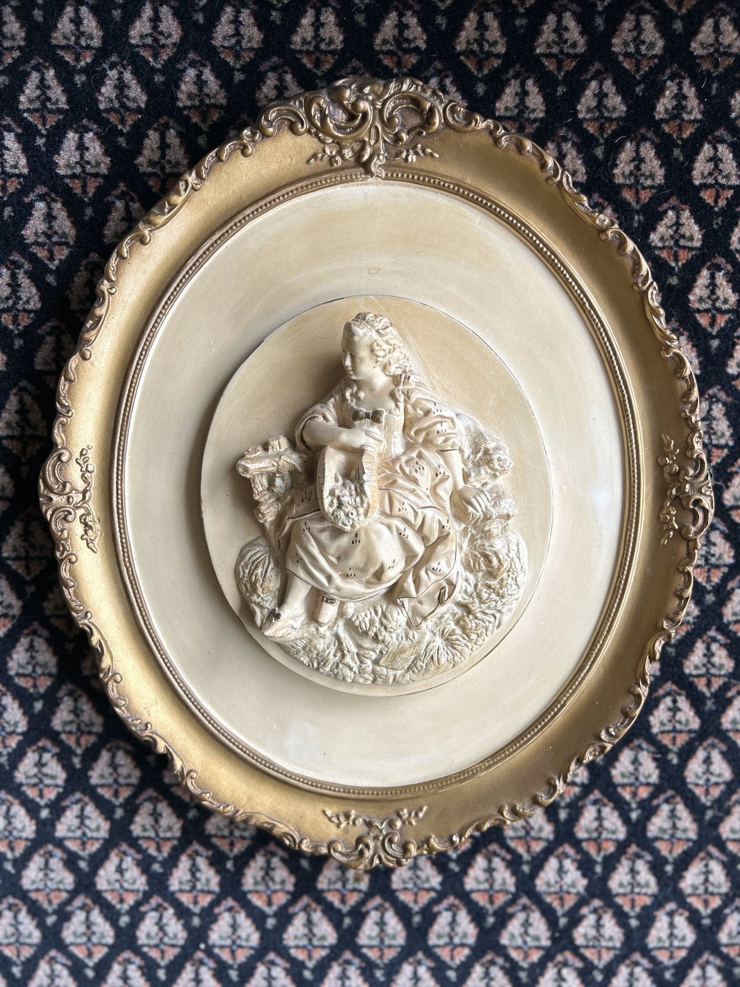 pair of heavy chalkware wall plaques