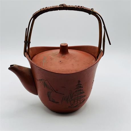 vintage Japanese teapot with reed handle