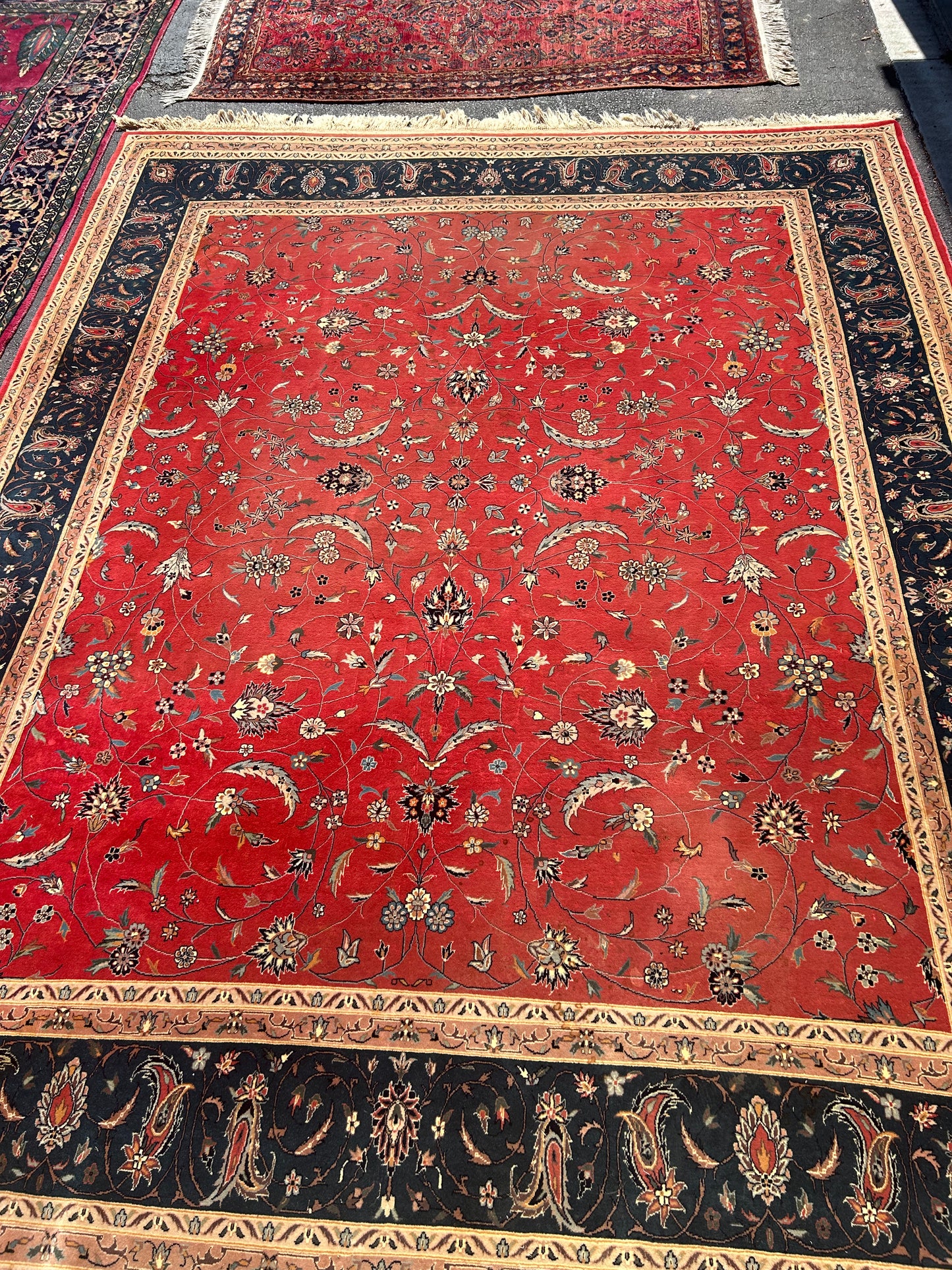 pink and black handwoven Sarouk rug